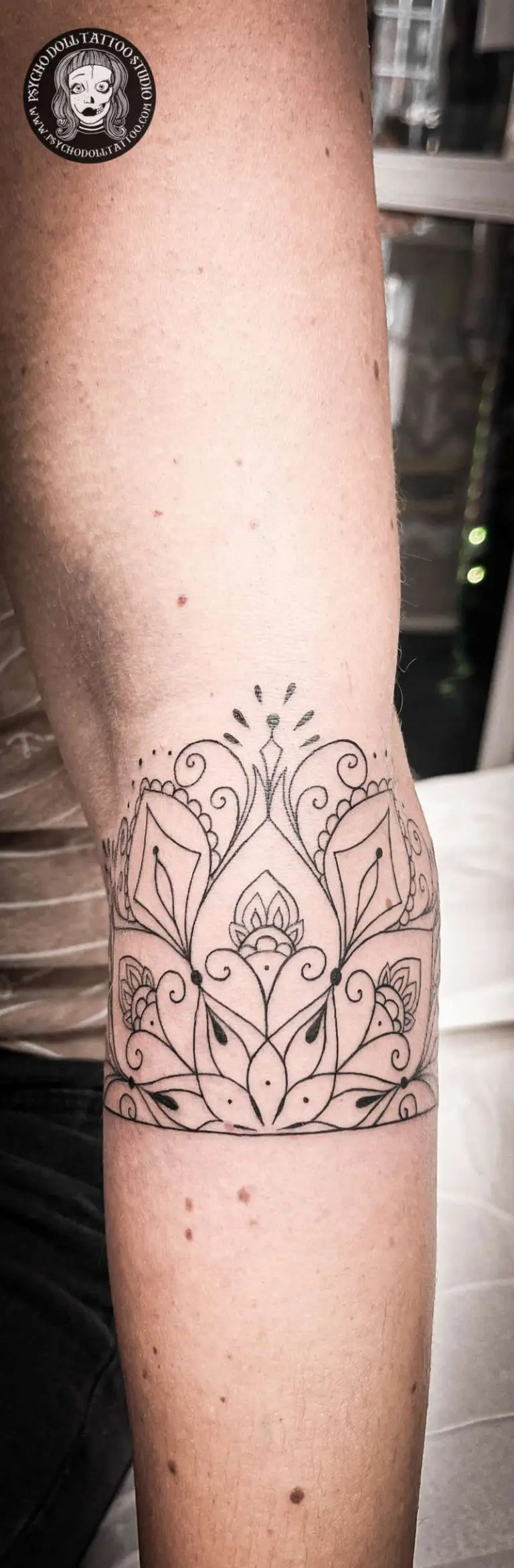 mandala fine line tattoo