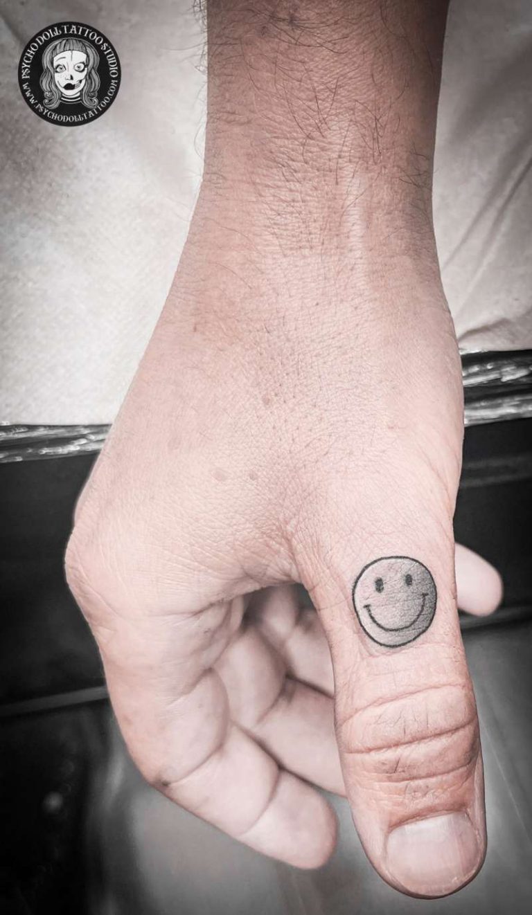 smiley tattoo