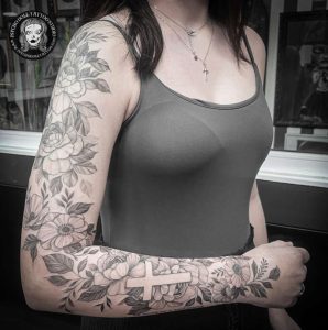 Fine line flowers tattoo (arm)