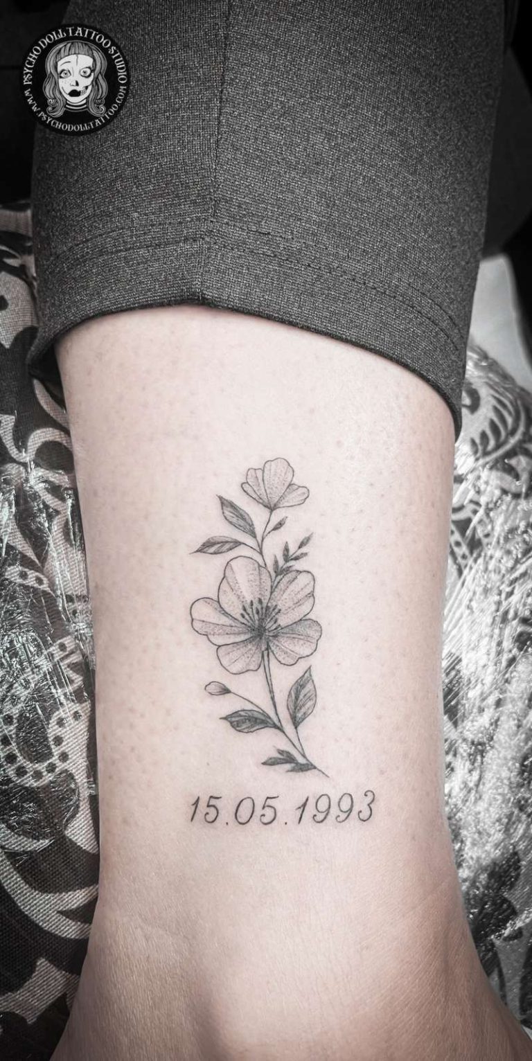 flower tattoo fine line tattoo
