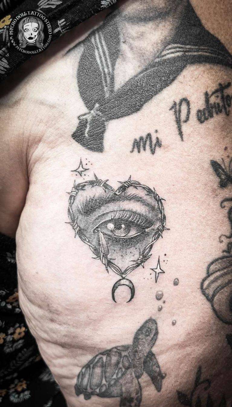 tatuaje ojo corazon realista